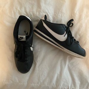 Black Nike Cortez sneakers